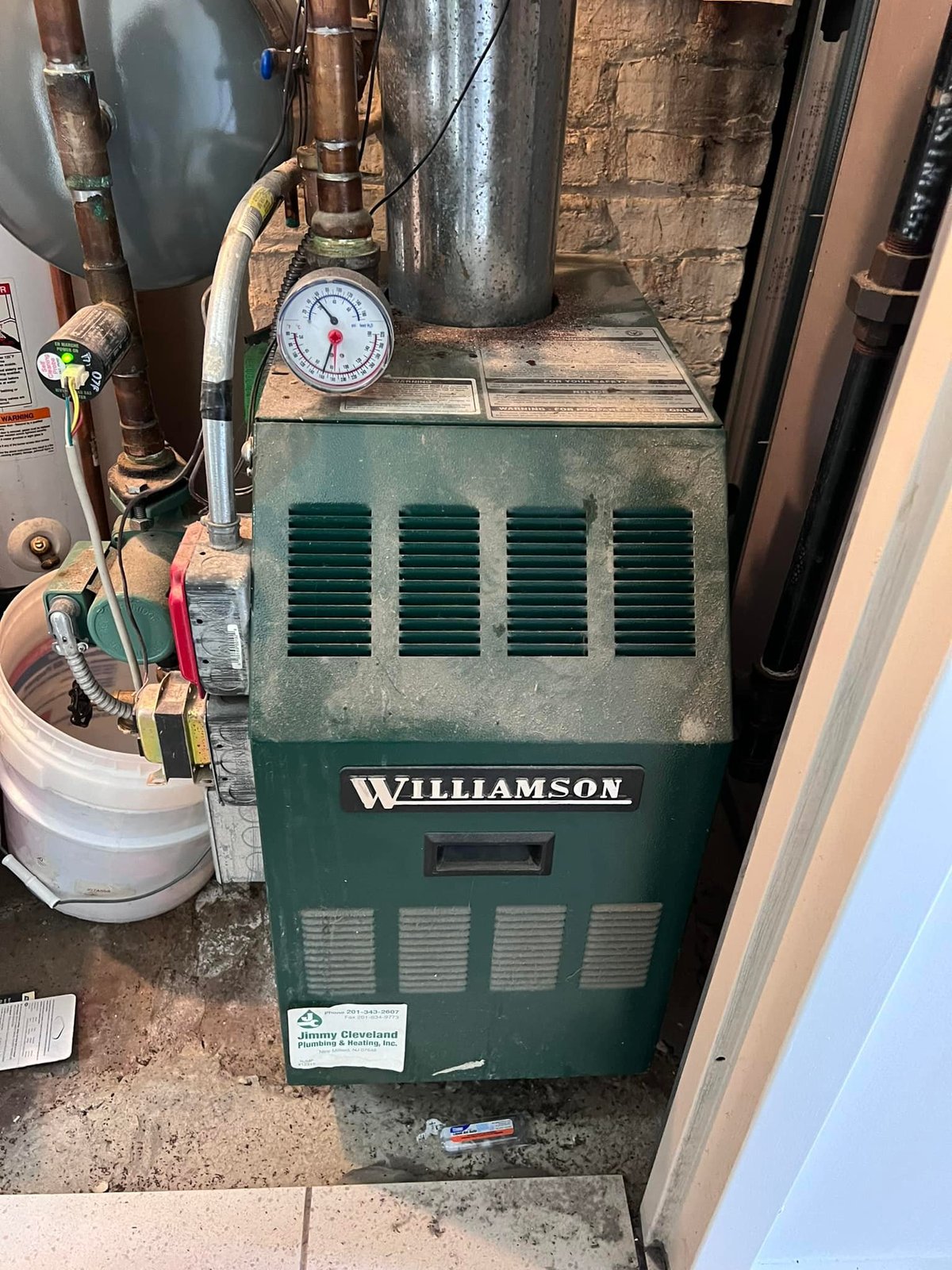 Old Williamson gas boiler still running when I bought the place. Lived its life.