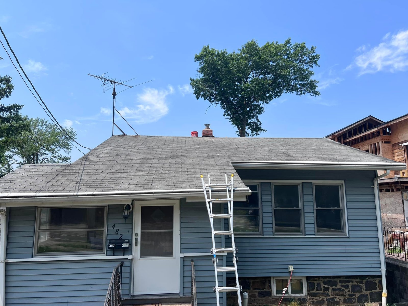 Set the extension ladder up to walk the chimney before the tear-off so I knew what I was paying for.