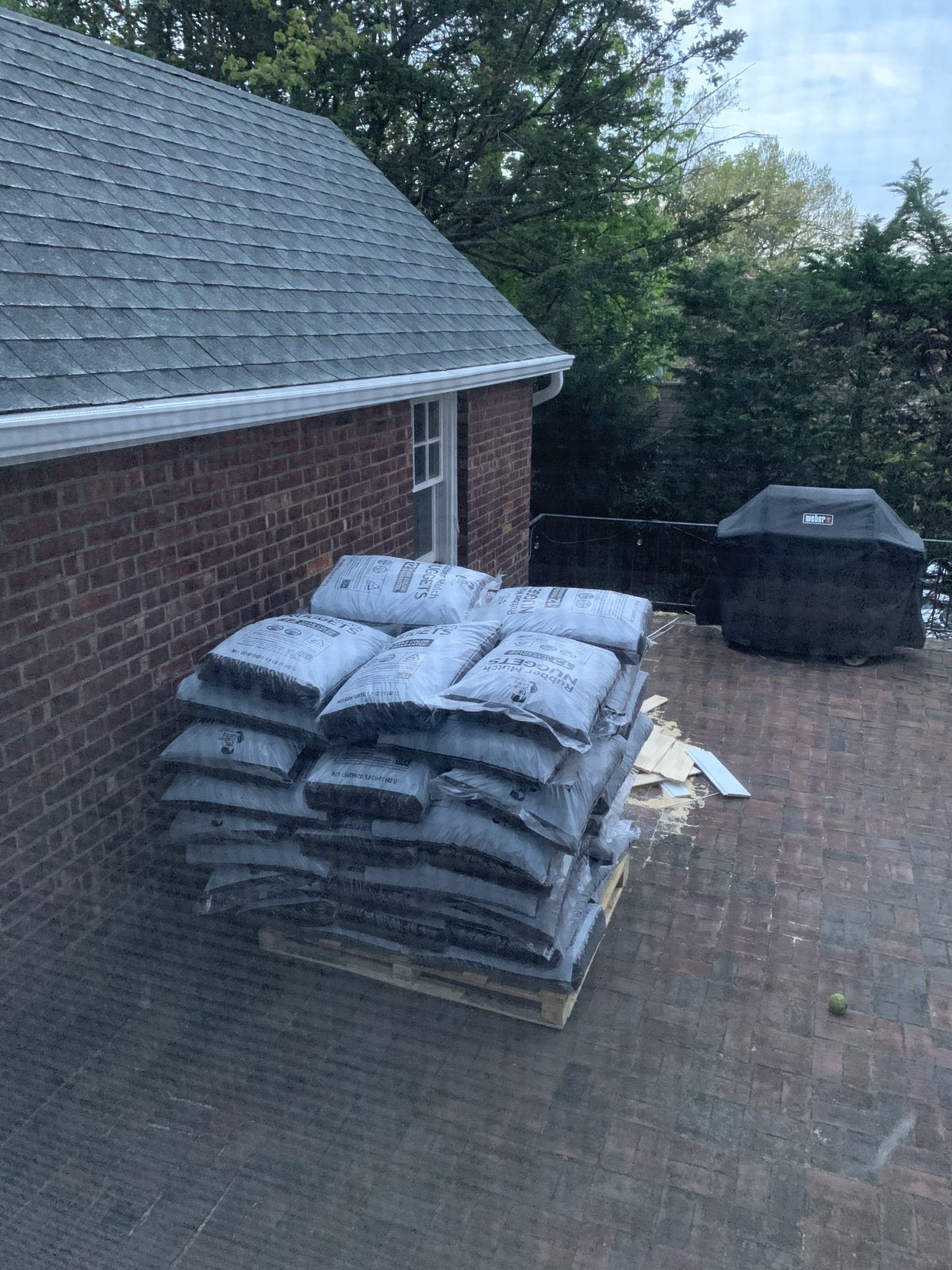 Refreshing the Beds with Rubber Mulch