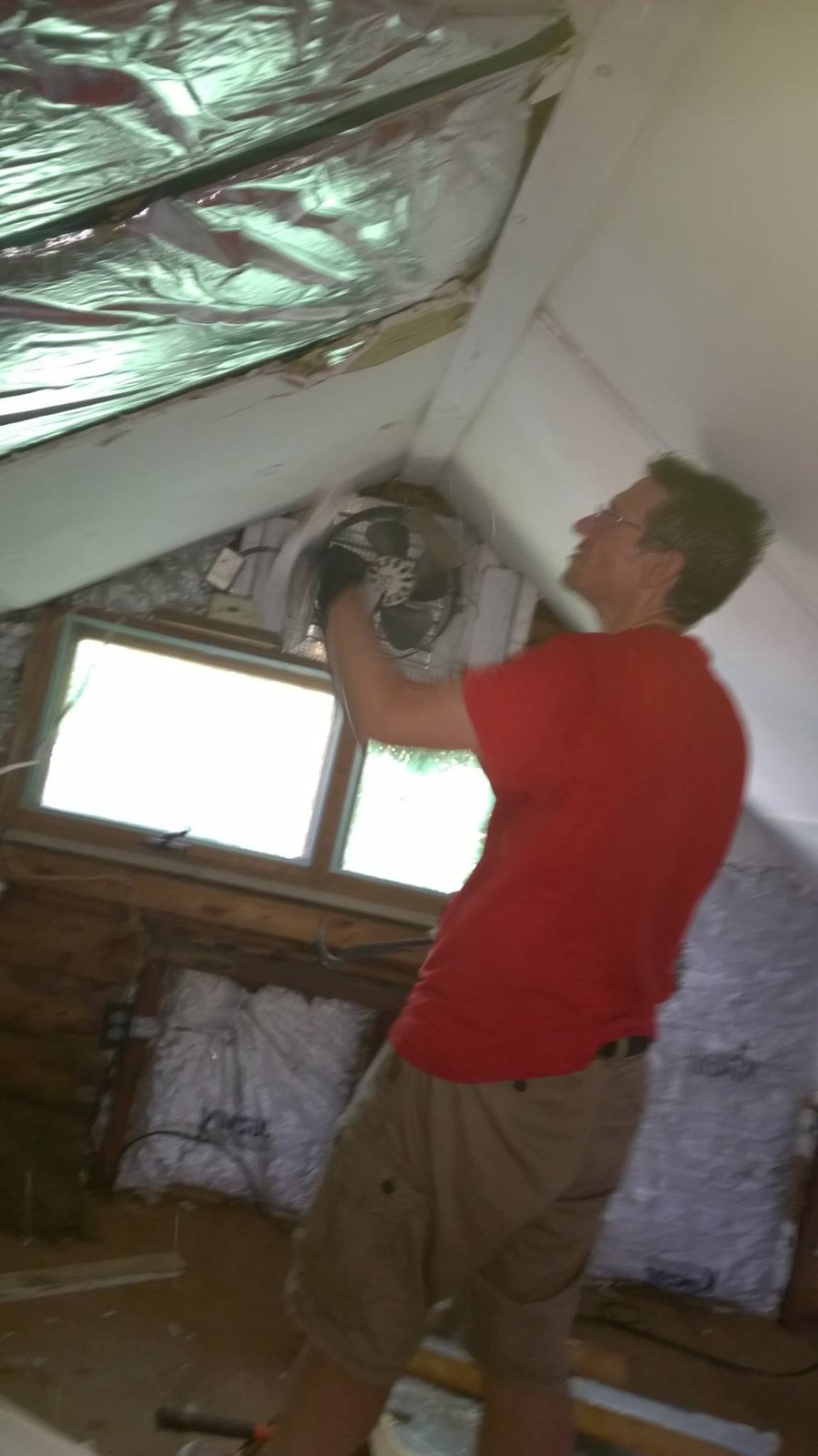 Installing the gable fan myself. Wanted active ventilation up here to keep summer heat from cooking the room.
