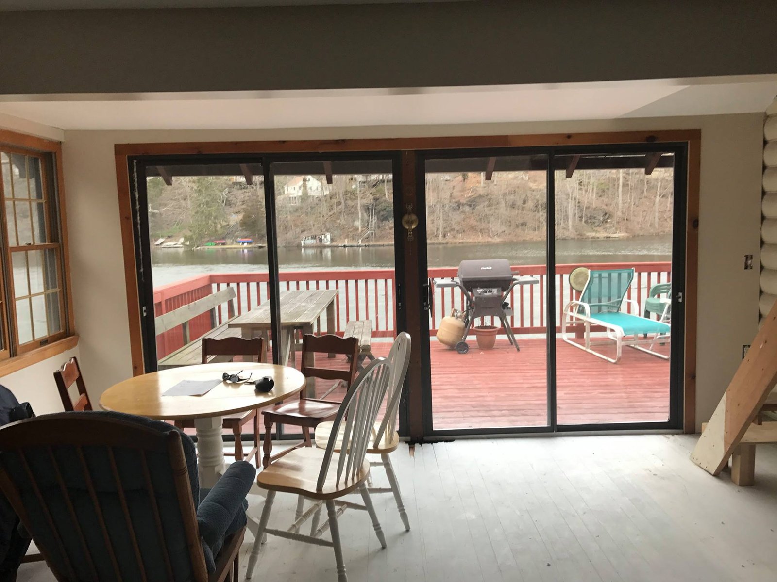 Looking through the new sliders to the deck. View I bought the place for.