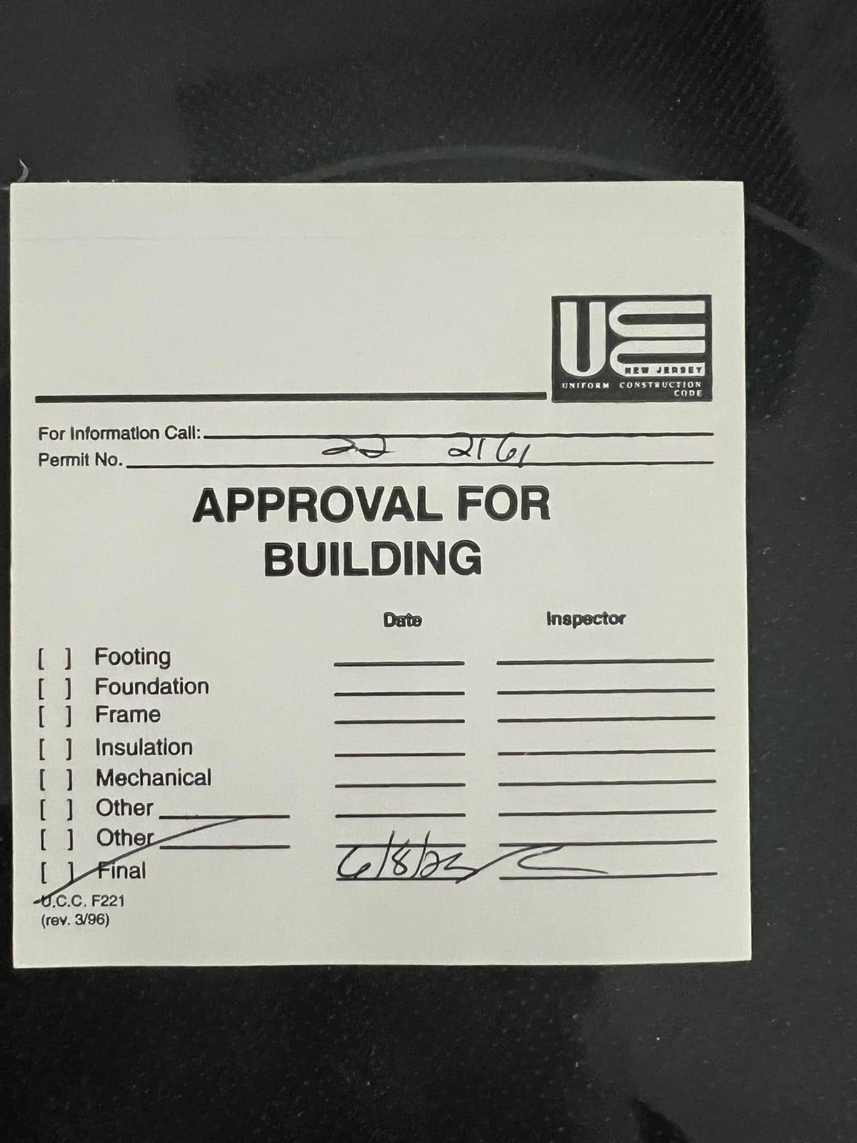 Final inspection signed off on the building permit. The attic was now legal living space.