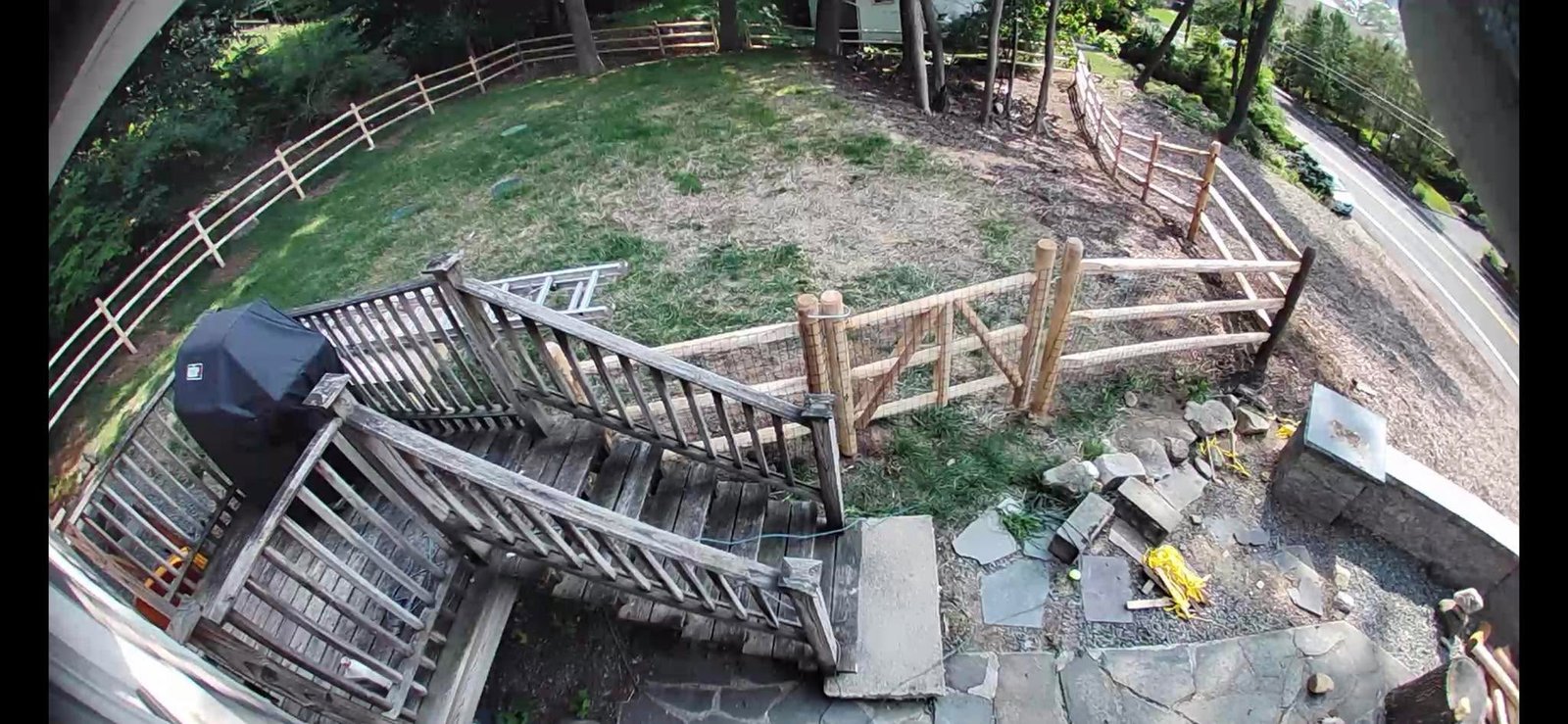 Deck stairs starting point. Railings loose, boards splitting.
