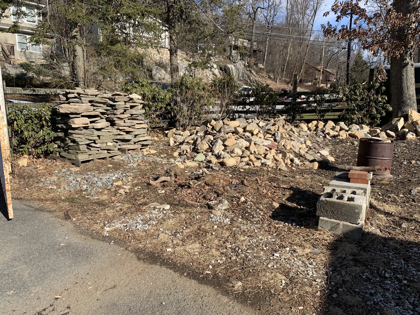 Pallet of flagstone and a pile of fieldstone staged. From here it was all hand work.