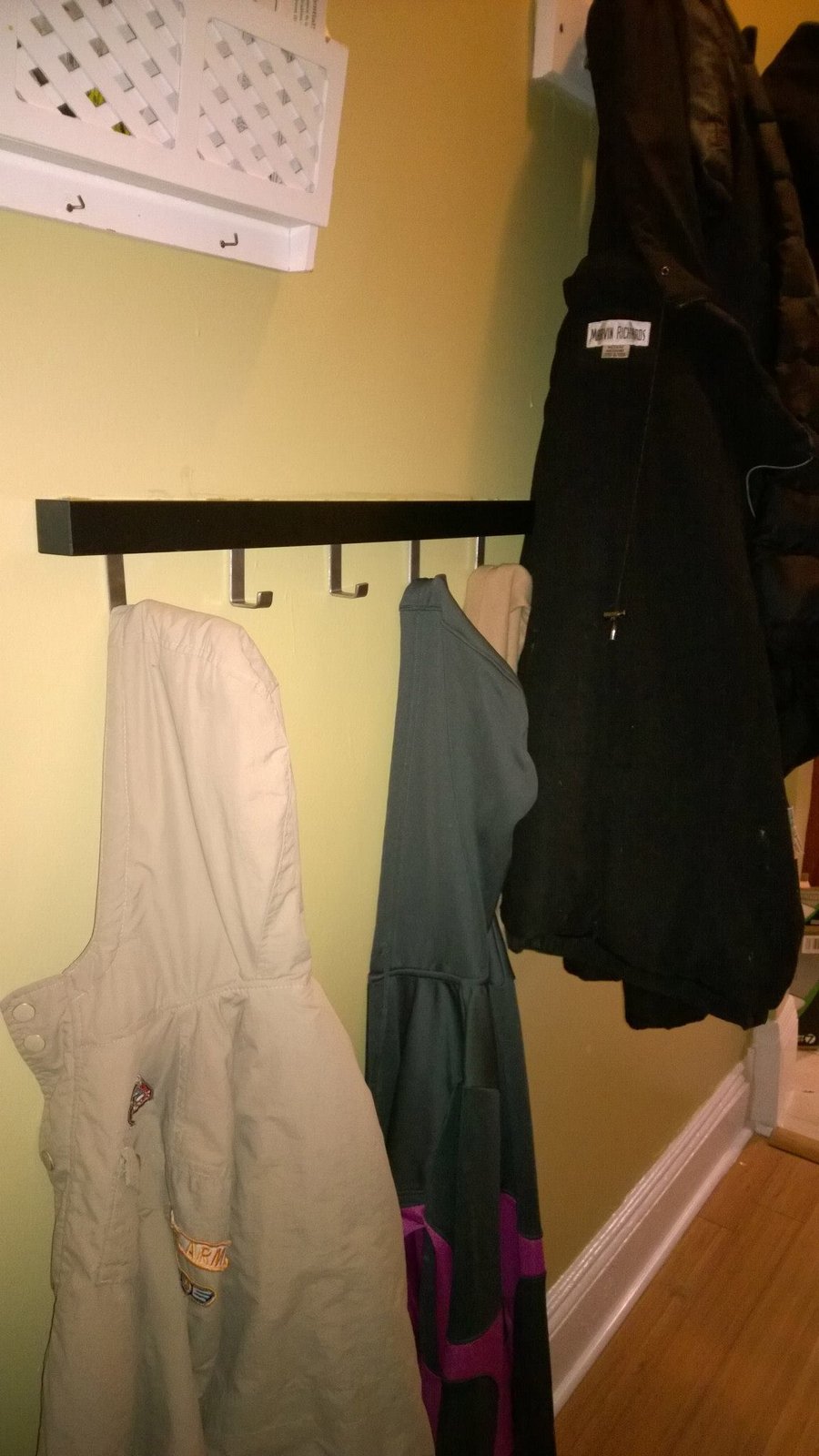 hung a coat rack at kid-height so the boys could put away their own jackets